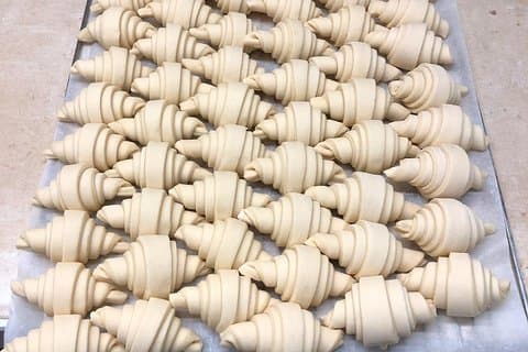 Croissants in the making! Learn how to make the dough and roll these delicious iconic French treats!