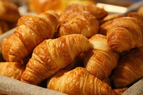 Croissants ! Emblématique, unique puff pastry pasta bread !! 
An way very special and long to make these so good breads, with pasta, very good French butter.. This is the prominent ingredients ..