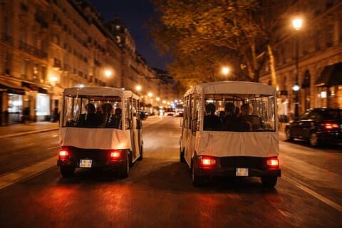 Cruise through Paris by night in a quiet, eco-friendly electric golf cart.