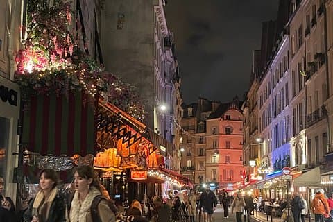 People stroll around bars and cafes from the Latino quarter