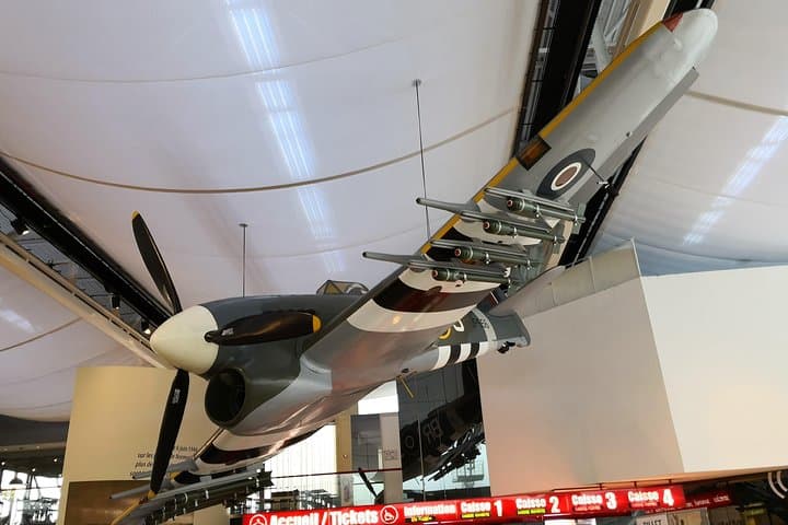 The Caen Memorial Museum - A "Hawker Typhoon" fighter aircraft (tank buster) is hanging to the hall center ceiling
