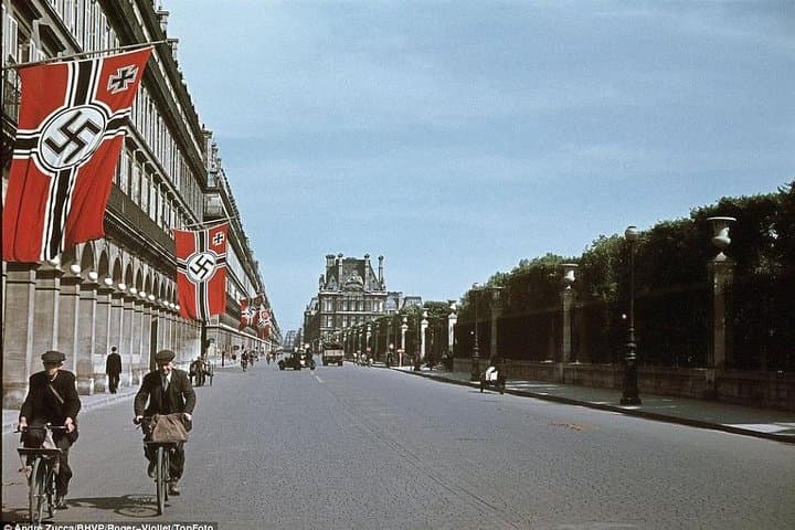 The Germans quickly took over the best hotels for their private use for headquarters and leisure. Here is Rue de Rivoli looking towards the Hotel Meurice . The French flag was banned from being flown