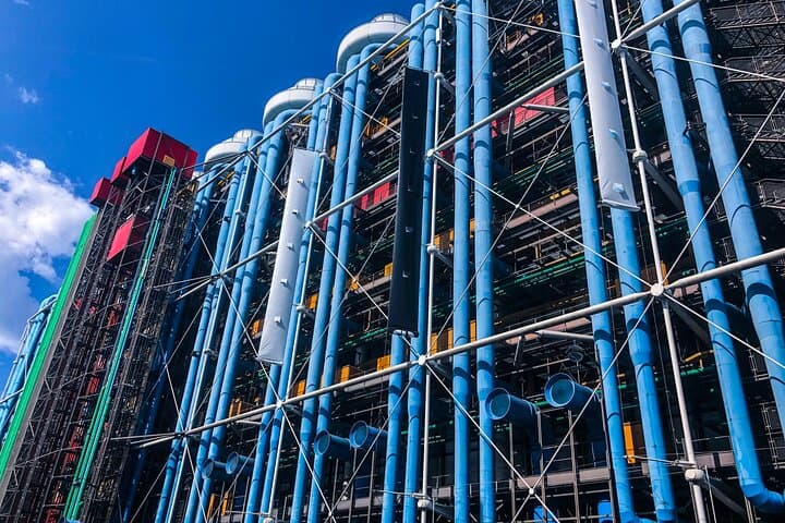 Side view of Pompidou Center adjacent to famous Stravinsky Fountain