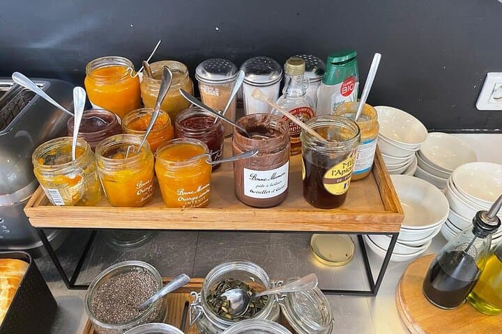I will offer “confiture bonne maman “ 
“Jam “