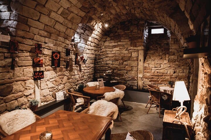Immersive cellar tour, tasting and board meal
