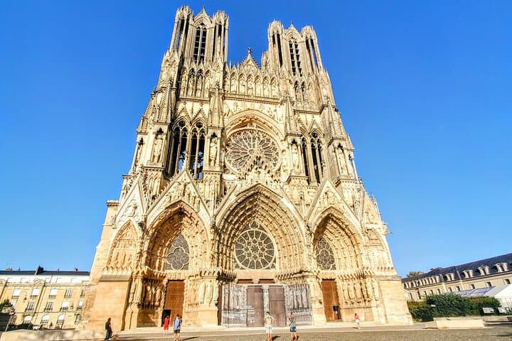 Visit the 800 years old Notre Dame of Reims, where the French Kings were crowned.