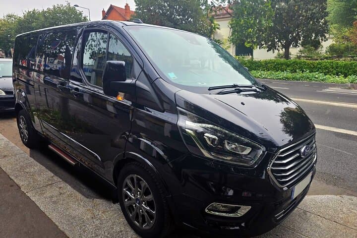 Your adventure awaits! Travel comfortably in our vans as we journey to the iconic Castle of Versailles.