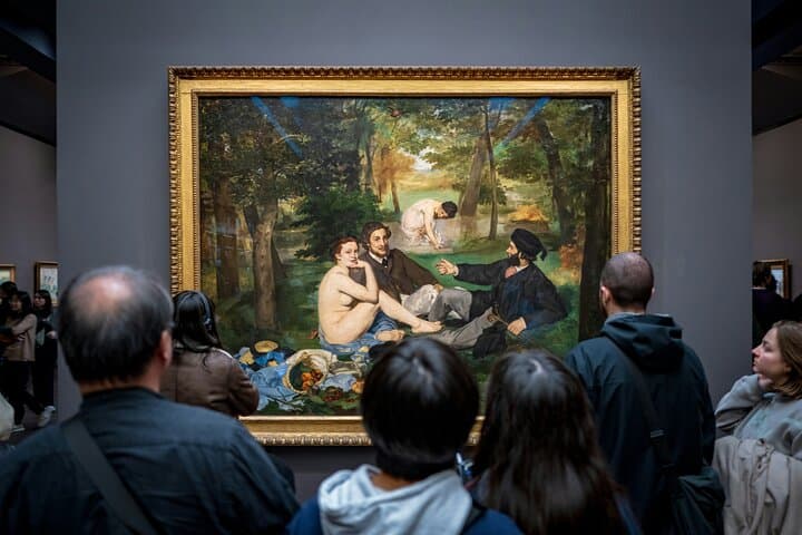 people in front of the painting