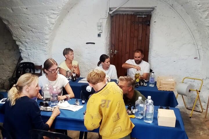 Carrying out a roll-on or cosmetic lotion during DE practical workshop.