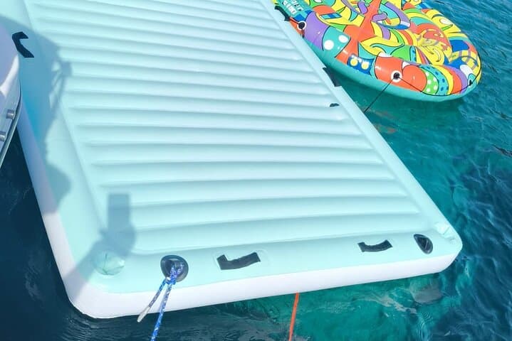 Floating mat and sea toys unincluded on board