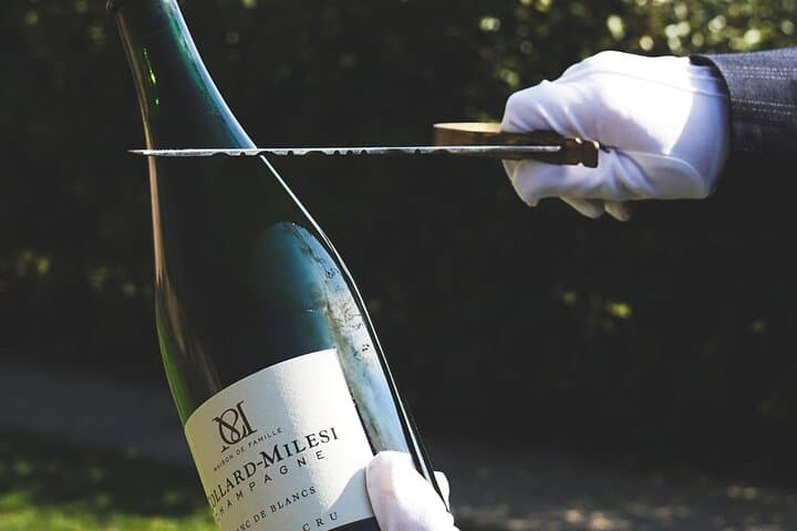 Master the precise technique of sabrage and open your Champagne like a true connoisseur.