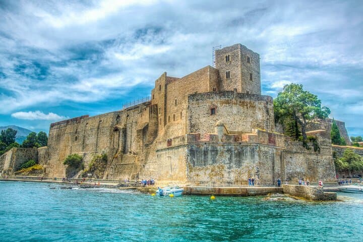 Royal Castle of Collioure: The imposing medieval fortress diving directly into the Mediterranean, former residence of the Kings of Mallorca.