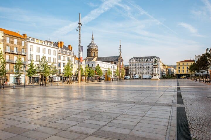 Place de Jaude: The beating heart of the city, dominated by the famous statue of Vercingetorix.