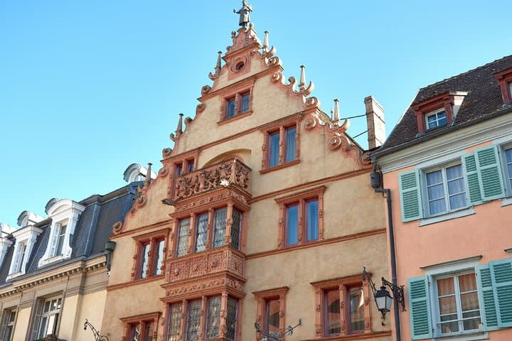 Renaissance Architecture: The magnificent scrolled gables, typical of wealthy merchant houses such as the Maison des Têtes.
