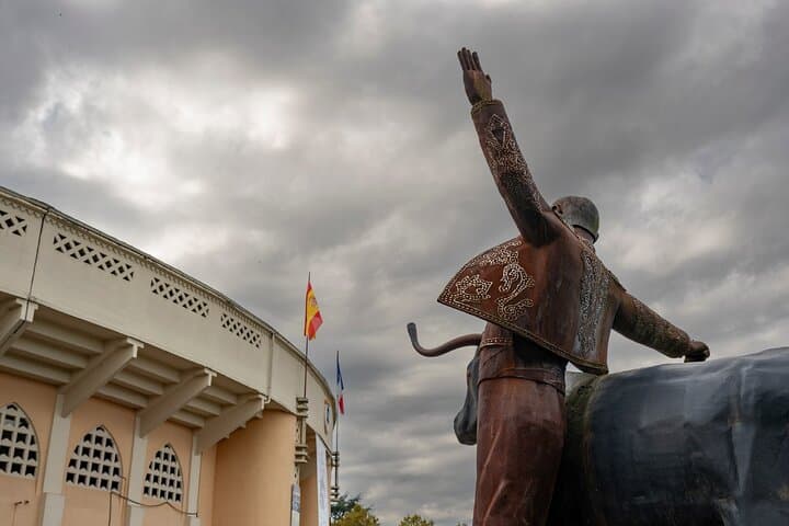Plumaçon Arena: The tribute to the bullfighting tradition with the statue of Torero erected in front of the entrance of the bullring.