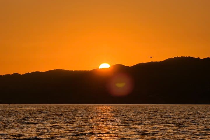 Sunset Sailing Cruise with aperitif at the Island