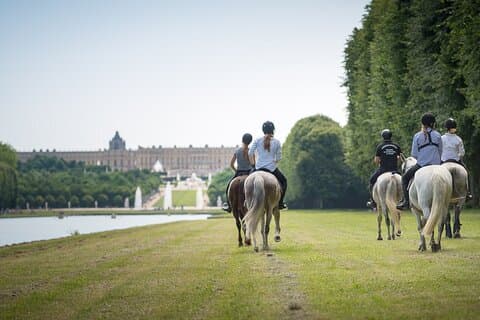 Horse-riding in the Gardens of Versailles - Photo from Les Airelles