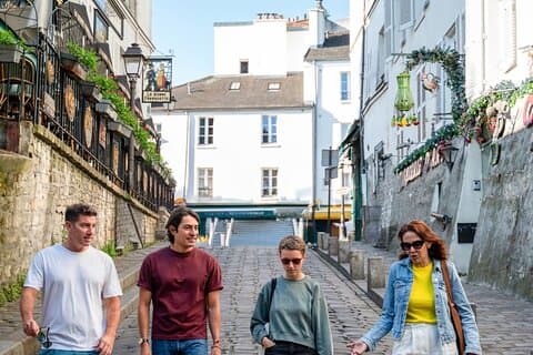 Paris in a Day: Louvre Tour + Guided Montmartre & City Walks