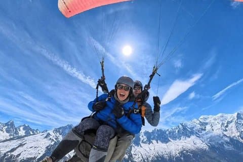Paragliding baptism facing Mont Blanc