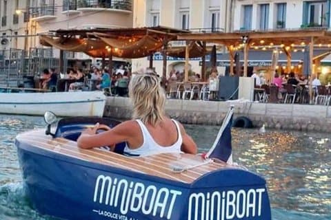 Set in miniboat at sunset