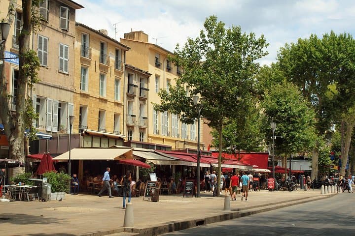 The Cours Mirabeau of Aix-en-Provence and its shaded terraces