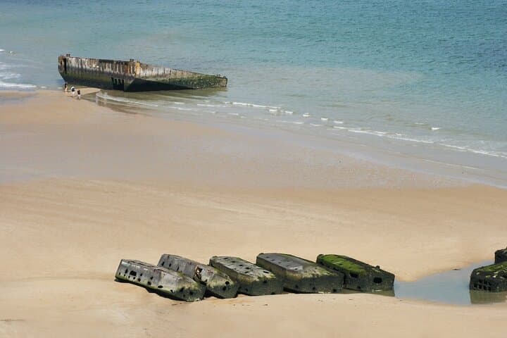 The artificial harbor at Arromanches, France. Link Paris