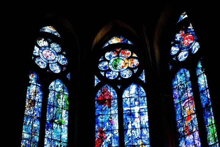 The Marc Chagall windows inside Reims cathedral in Reims, France. Link Paris