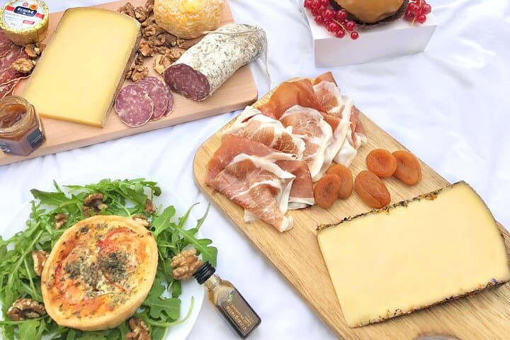 Experience a Decadent French Picnic with Wine Pairing in Paris