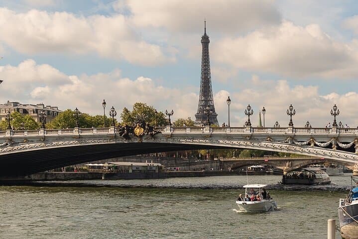 Paris Boat Club boat under the Pont Alexandre III