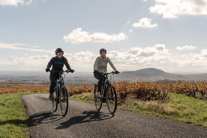 Beaujolais by bike and Mont Brouilly in the background