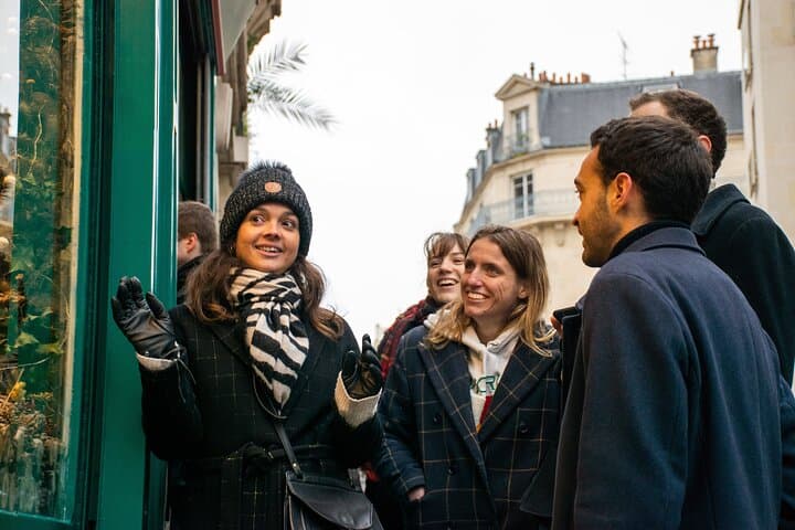 People in winter clothes laughing and talking together