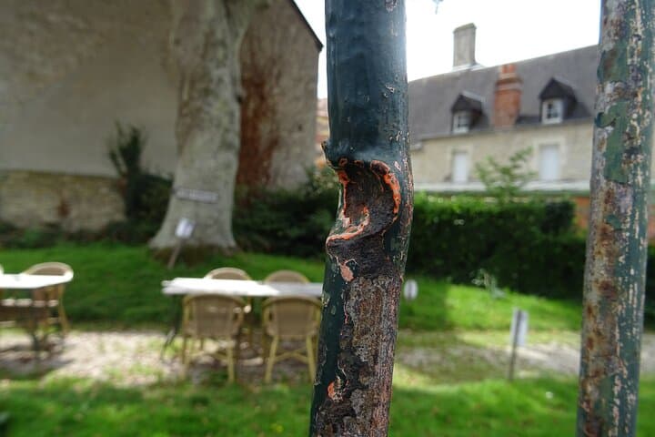 Sainte-Mere-Eglise, Church Square - Bullet impact on the grid of the former German command post.