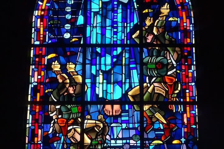 Sainte Mere Eglise Church - Detail of a stained glass window