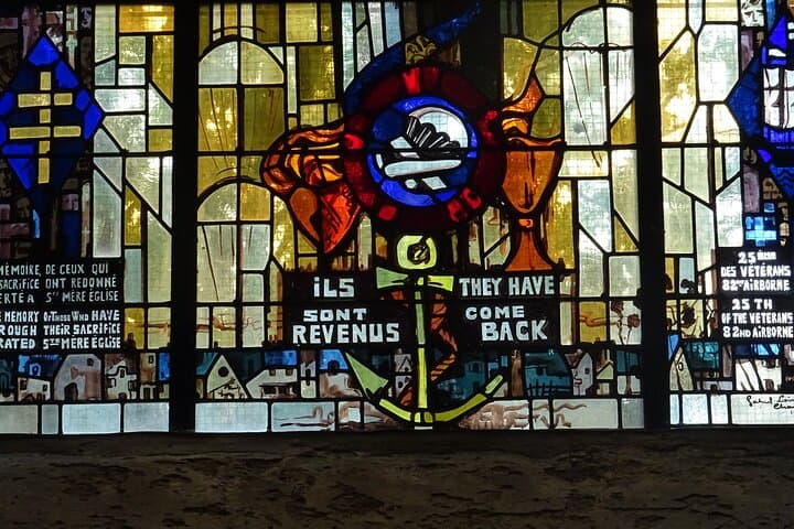Sainte Mere Eglise Church - Detail of a stained glass window