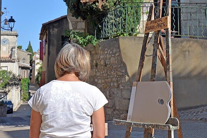 Student painting in the picturesque artists' village of Les Angles.