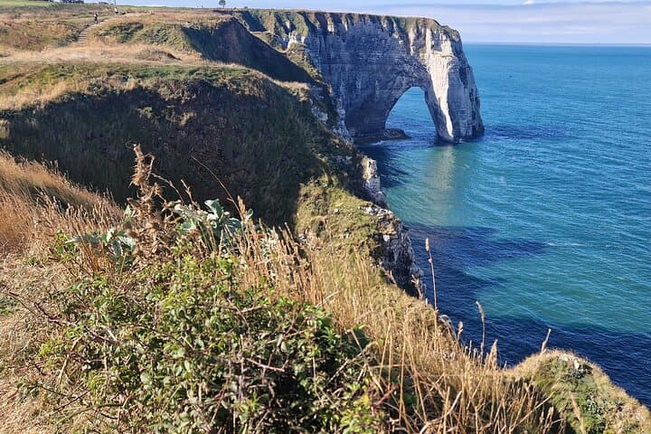 The Aval cliff (left) in the shape of an arch, Etretat Normandy