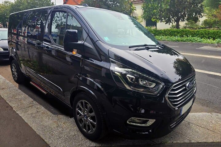 Round-trip in a comfortable van from Paris.