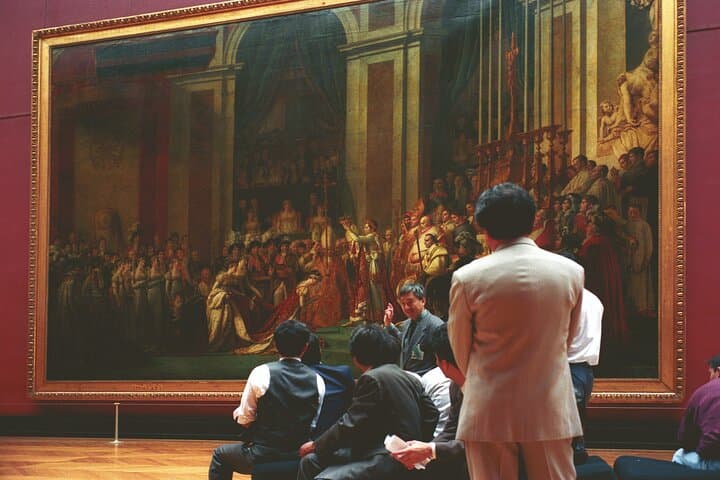 Louvre museum with small group