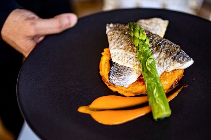 Seabass filet with a delicate vegetable tart.