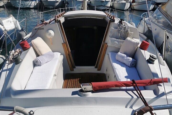 Aperitif on the island in vintage sailboat