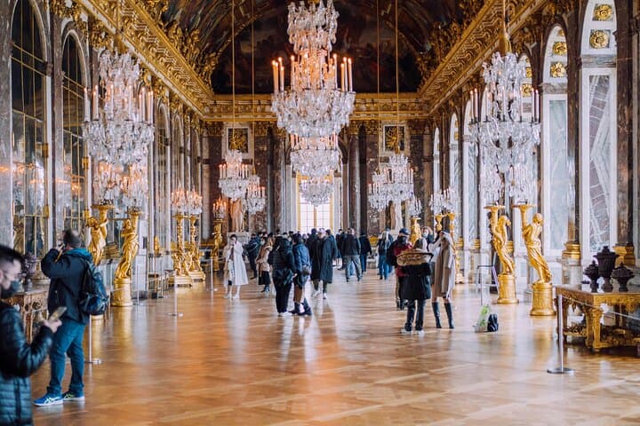 Step inside the iconic Hall of Mirrors – Versailles at its most dazzling.