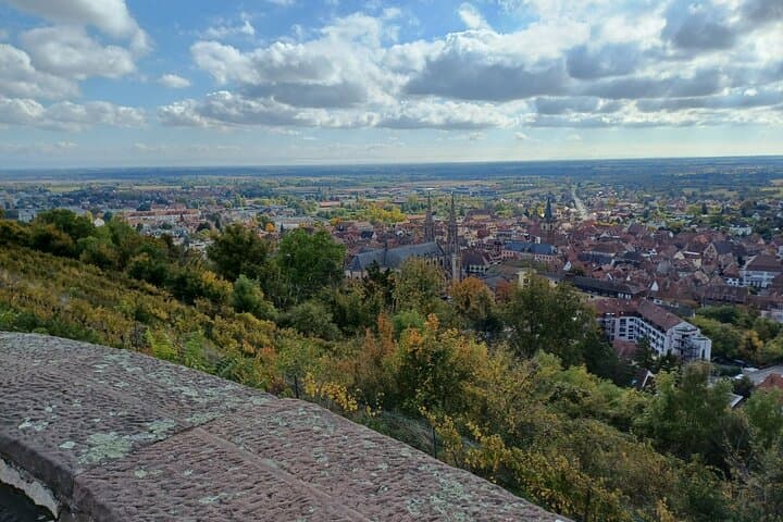 Stop at Mont Nationale with views of the plain of Alsace and the Cathedral in the distance