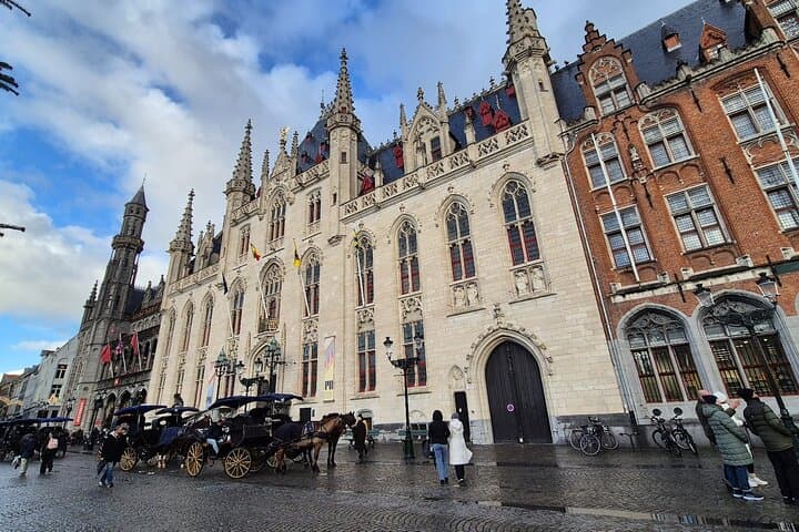 Bruges Private Tour from Paris with Champagne and Canal Cruise