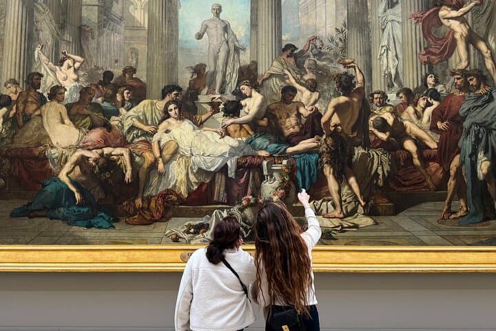Tourists admiring artwork at the Orsay museum