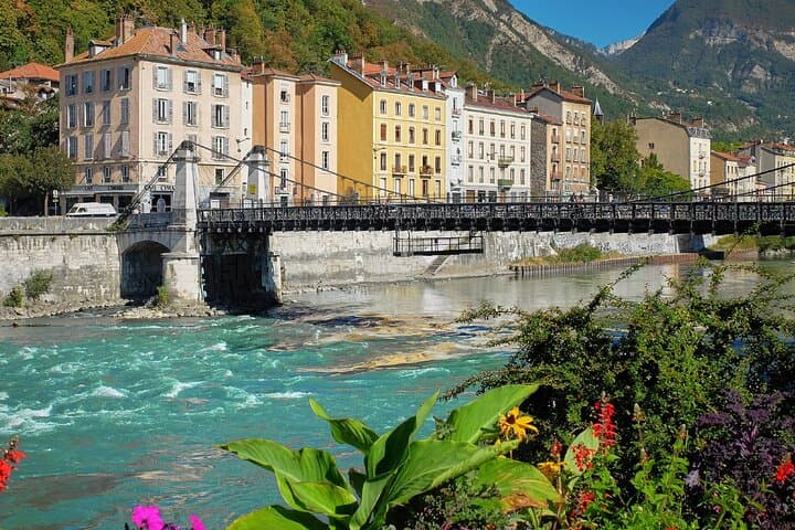 Saint-Laurent Bridge: The "Italian" district with colorful facades on the Isere riverbanks.