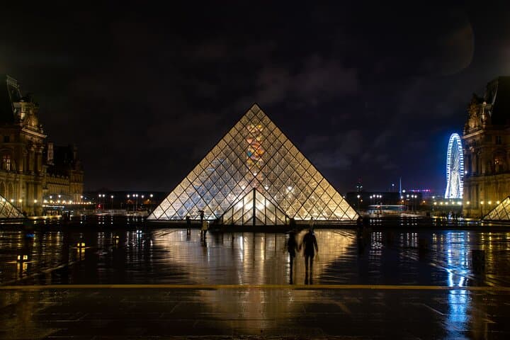 Louvre pyramid at night