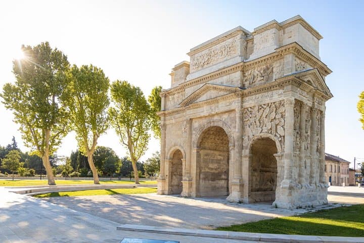 Arc de Triomphe: The magnificence of Roman sculptures glorifying veterans of the Second Legion, classified as UNESCO.