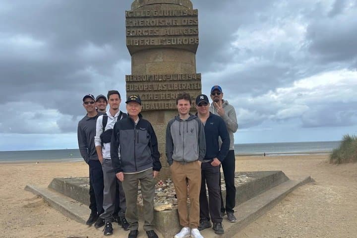 happy clients front memorial dday beaches