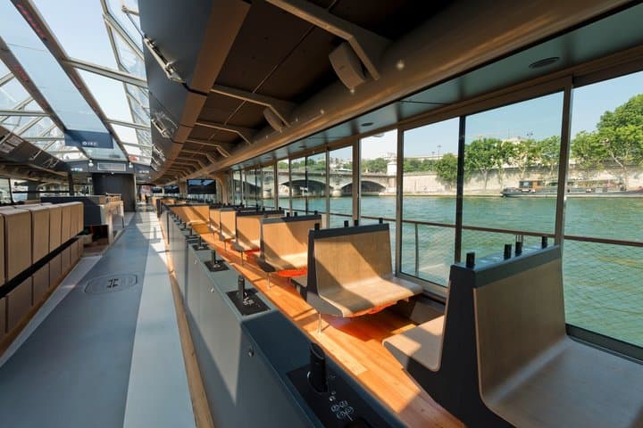 Paris Eiffel Tower District Tour and Seine River Cruise
