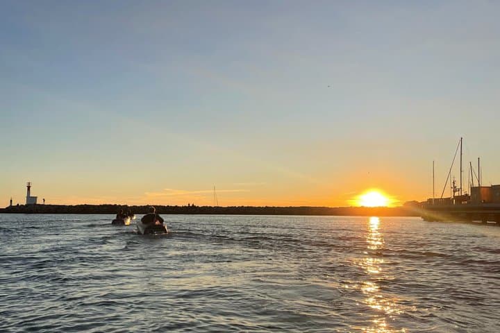 Set in miniboat at sunset